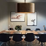 Drum pendant light in contemporary dining room setting