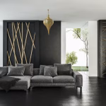 Engraved brass pendant light complementing contemporary decor