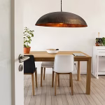 Hammered dome pendant light in minimalist dining room