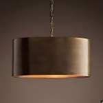 Modern drum pendant light dramatic dark background