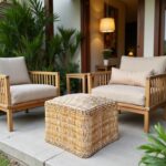 Outdoor patio arrangement with square straw ottoman pouf and rattan furniture