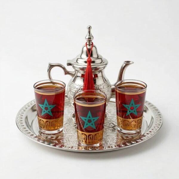 A small moroccan tea set with a silver teapot and three glasses featuring a teal Moroccan star design, displayed on a clean white background.