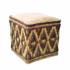 Handcrafted square straw floor pouf with diamond pattern on white background