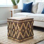 Living room setup featuring geometric straw floor pouf and blue accents