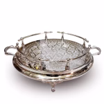 Luxury silver hand-engraved large round tray with ornate handles and decorative gallery rail on white background