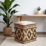 Minimalist home office with natural straw floor pouf and wooden furniture