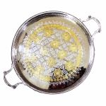 Overhead view of silver and gold big round tray showcasing intricate hand-engraved Moroccan geometric pattern