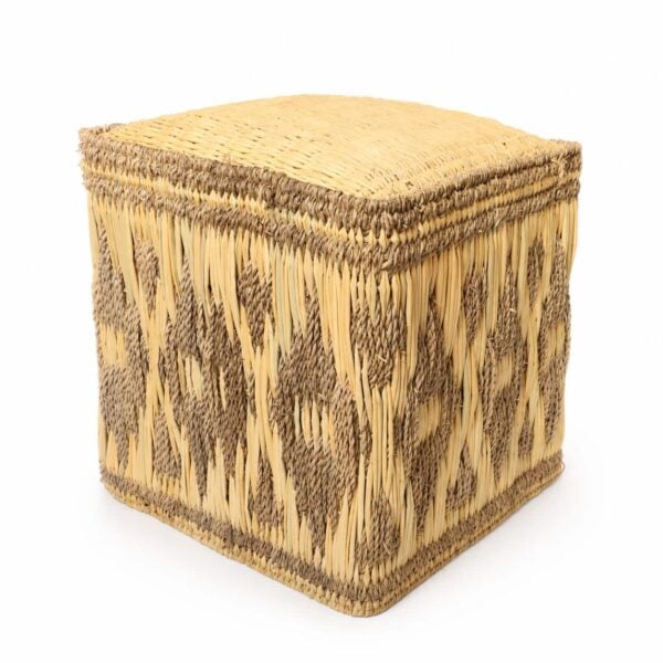 Isolated square straw floor pouf with a dark geometric diamond pattern on a clean white background.