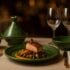 Professional restaurant table setting showcasing authentic Moroccan ceramic restaurant tableware with distinctive Tamegroute pottery green glaze and traditional geometric patterns, featuring gourmet food presentation that demonstrates superior dining experience enhancement