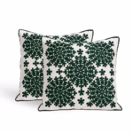 Close-up of forest green embroidery detail on Moroccan sofa cushion cover