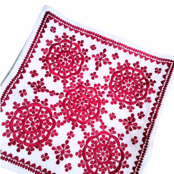 Crimson red embroidered cushion cover with traditional Moroccan medallion motif