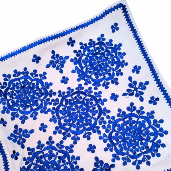 Royal blue embroidered cushion cover with traditional floral pattern