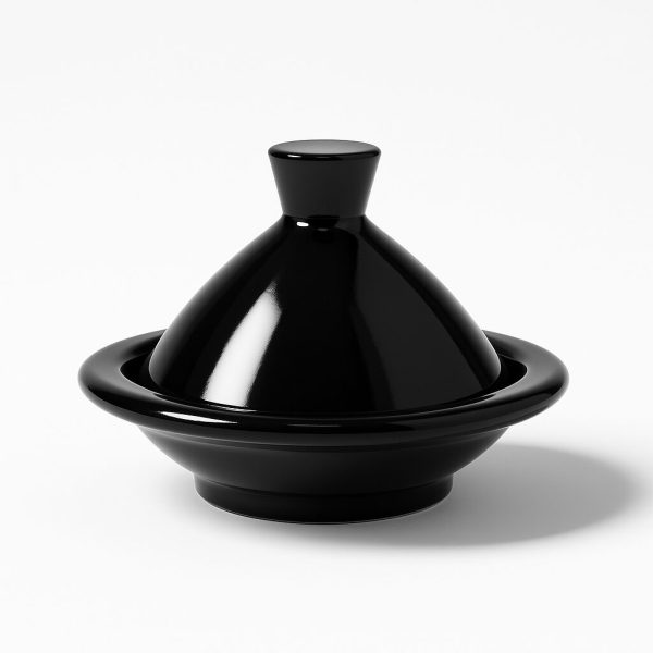 Jet-black ceramic mini tagine with mirror-like shine, isolated on a white background.