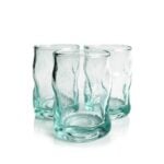 Single aqua-tinted recycled glass tea glass measuring three inches high and one point seven five inches wide