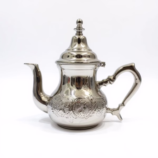 How to Clean Teapot: Complete Guide for Gift Care & Authentic Moroccan Tea Culture Front‑facing view of a lustrous hand‑engraved silver teapot against a pure‑white background