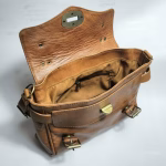 Vintage Leather Satchel Bag interior — light brown genuine leather with open flap, zip pocket, and compartments.