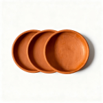 Handmade terracotta ceramic plates set of three with natural clay texture and warm rust-orange finish