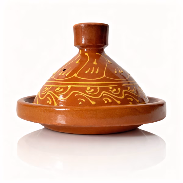 authentic tagine pot with traditional Moroccan geometric patterns on white background