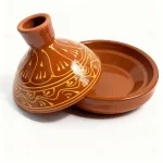 Open terracotta tagine pot showing conical lid and base, hand-painted golden ceramic clay cookware design