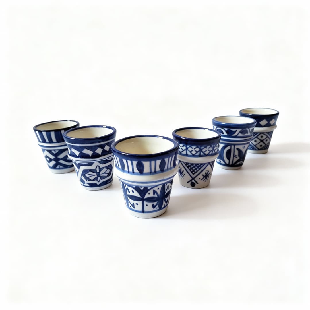 Ceramic Espresso Cups Set (6) Complete set of six handpainted ceramic espresso cups showing variety of blue and white geometric patterns