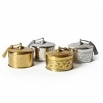 Complete set of decorative metal boxes - one large brass gold and one small silver with engraved patterns