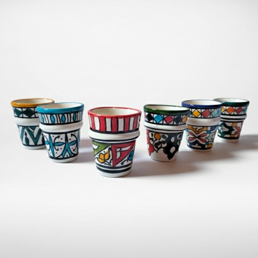 Handpainted Ceramic Espresso Cups - 6 Cup Artisan Set (1) Handpainted ceramic espresso cups set with colorful geometric patterns in red, blue, green, and yellow designs
