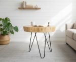 Live edge wood side table styled in modern white living room with plants and neutral decor