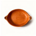 Single terracotta oval baking dish with handles showing depth and interior surface