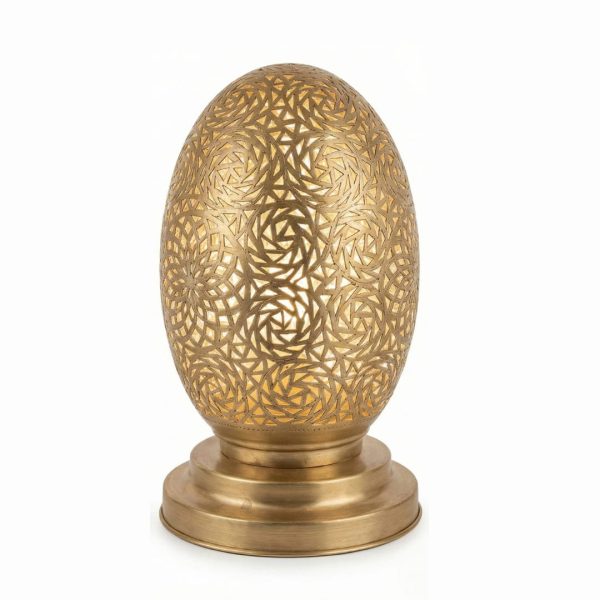 Single brass oval table lamp with egg-shaped shade displaying intricate hand-carved rose vortex design