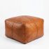 Cognac braided leather square ottoman with herringbone weave pattern - handcrafted artisan pouf