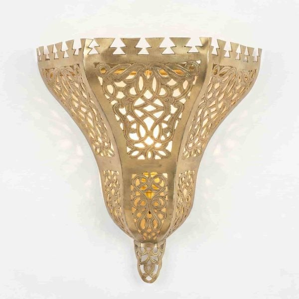 Brass filigree wall sconce with hand-pierced arabesque cutwork on white background