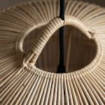 Close-up of handwoven rattan loop top on natural pendant light shade – artisan detail