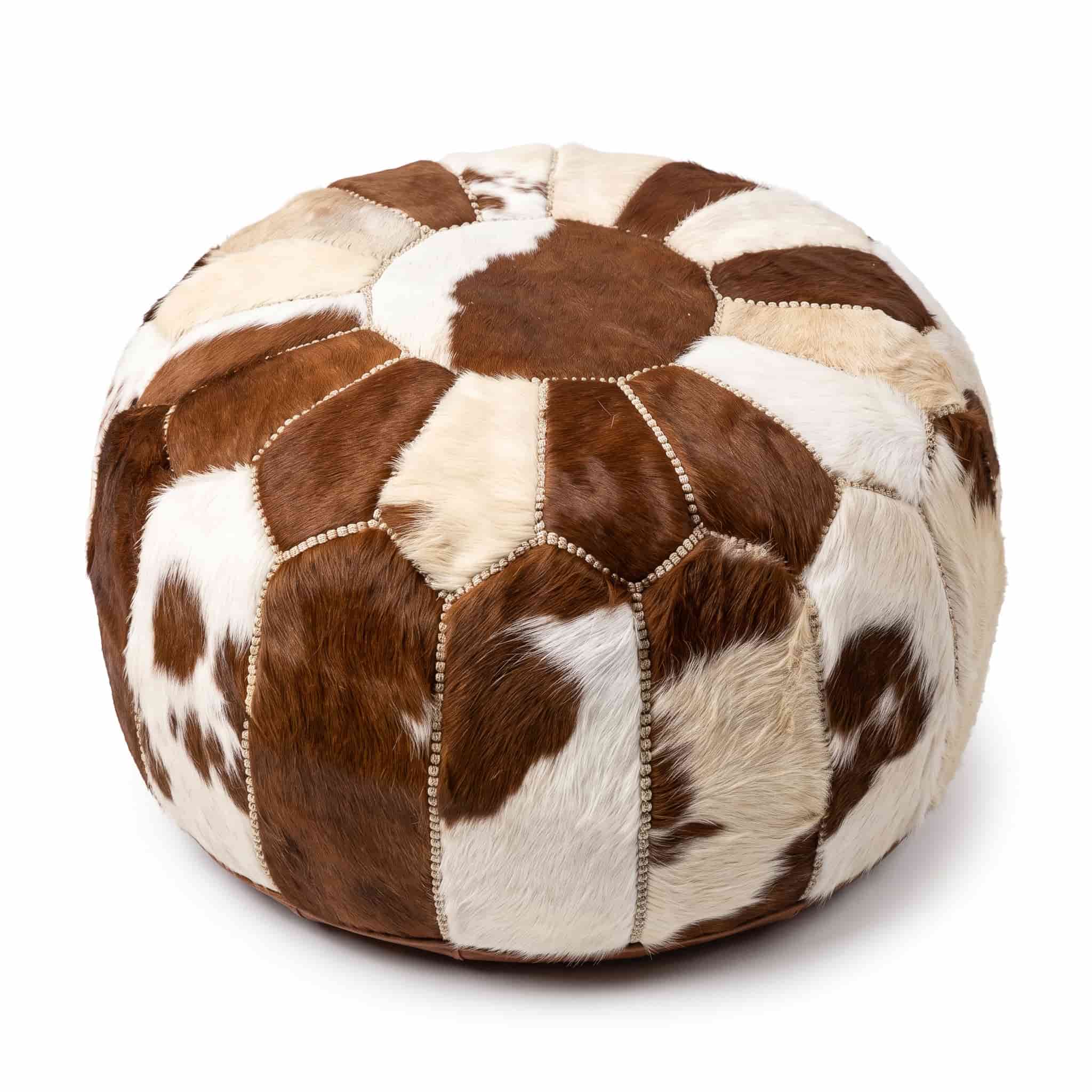 brown-white-cowhide-pouf-round-hair-on-hide Brown and white cowhide pouf, round hair-on-hide ottoman with braided stitching, on white background