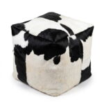 Square cowhide pouf in black and white hair-on-hide with four-panel top