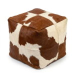 Square cowhide pouf in brown and white hair-on-hide with four-panel top